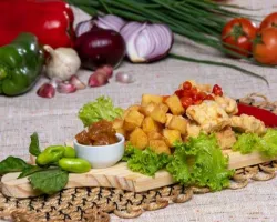 ‘Comida di Buteco’ traz elementos da cozinha raiz