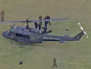 Dois helicópteros da polícia são atingidos por tir