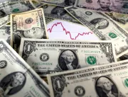 Dólar opera acima dos R$ 5,12 com pessimismo sobre