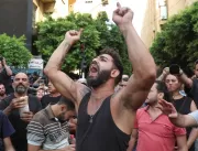 Homem invade banco no Líbano e vira herói, em meio