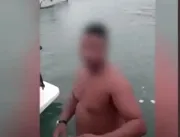 Vídeo: homem joga notas de R$ 50 no mar durante fe