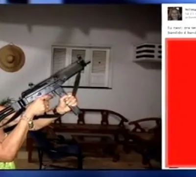 Delegada posta foto no facebook exibindo metralhadora