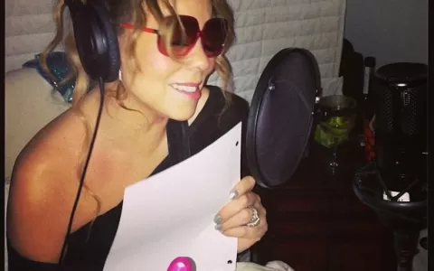 De tipoia, Mariah Carey ensaia nova música
