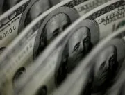 Dólar cai para R$ 5,11, mesmo em dia de protestos 