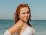 Curtindo a praia, atriz aposta em fio-dental peque