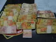 Homem é detido com R$ 14 mil e material de campanh